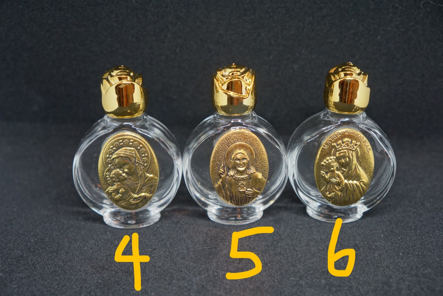 holy water bottle with gold deco